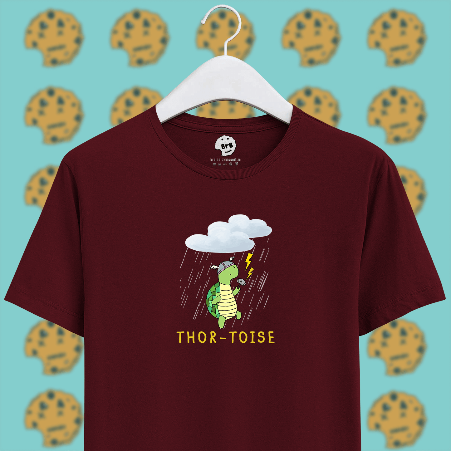 thortoise marvel joke pun on maroon colour unisex t-shirt with rain and lightning and clouds with animated tortoise holding thor's hammer.