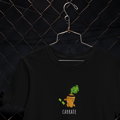 orange animated carrot with black headband chopping green leafy vegetables with karate chop on black t-shirt.