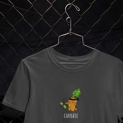 orange animated carrot with black headband chopping green leafy vegetables with karate chop on steel grey t-shirt.