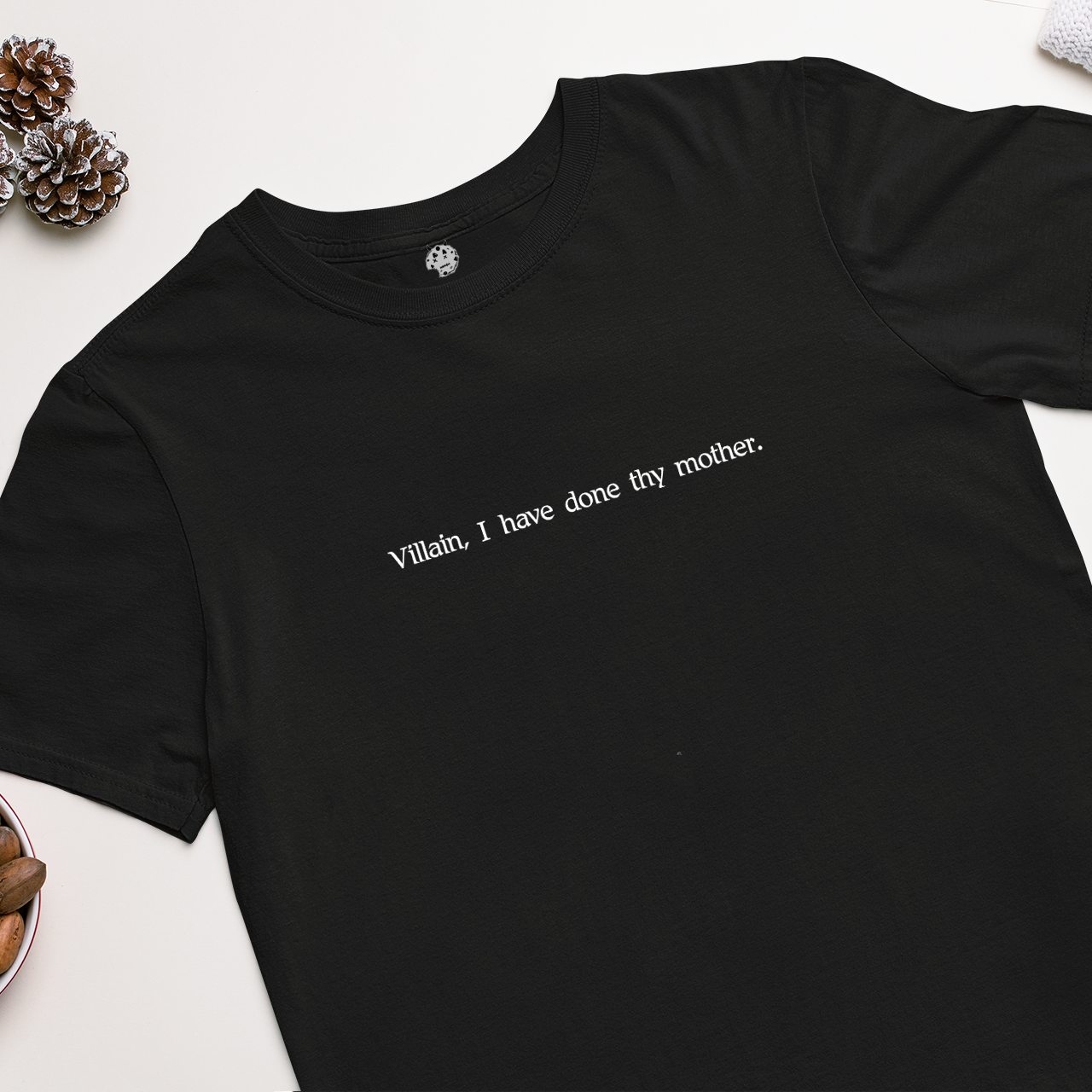 Titus Andronicus Act IV, Scene II Shakespearean insult on black t-shirt.